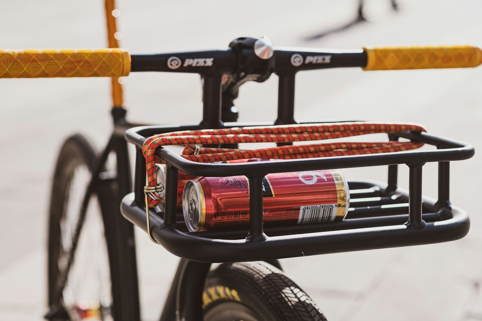 a bicycle with a red and white basket