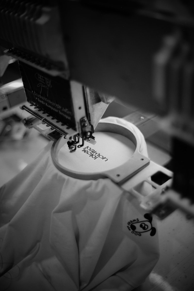 Embroidery machine stitching design onto fabric