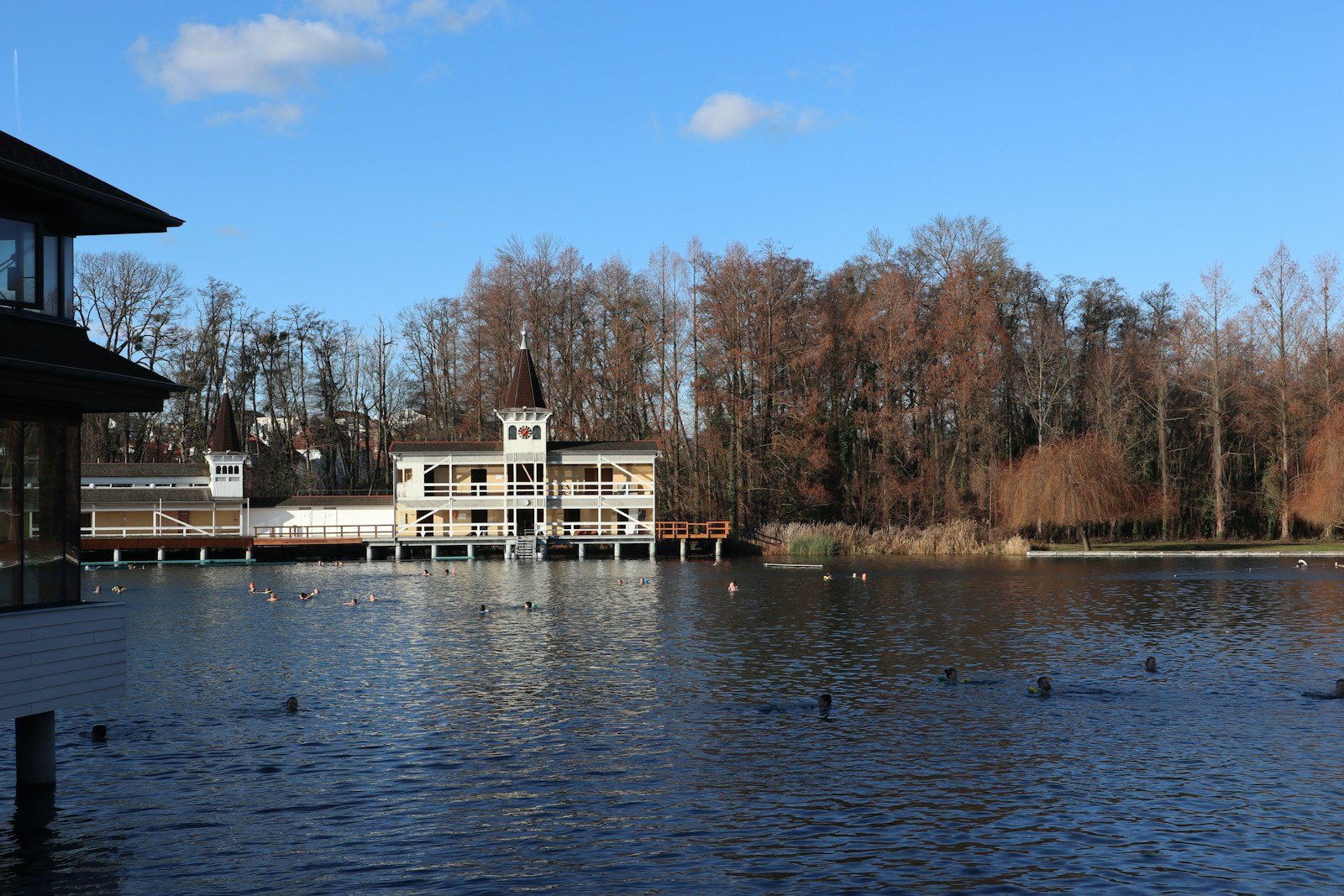 A large body of water with a building in the background